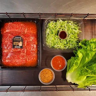 With $30 or more BBQ meat purchase, you&apos;ll receive freshly washed lettuce, green onion salad, house special ssamjang and hot sauce.