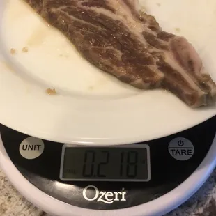 a piece of bacon on a scale