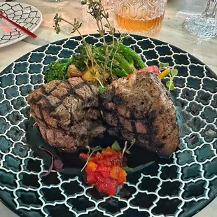 Special fillet and lamb with a demi glace with truffle potato&apos;s and veggies