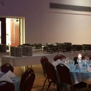 a dining room with tables and chairs