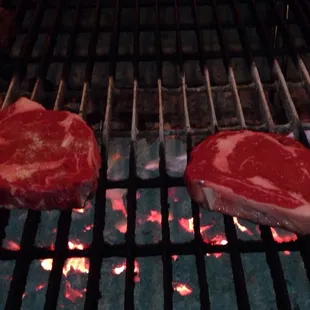 Our two steaks close to the flames.