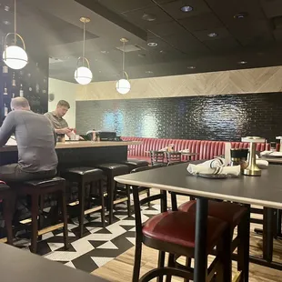 a man sitting at the bar