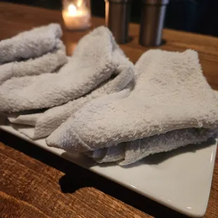 Warm towels post-dinner to clean our hands.