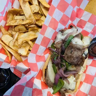 Philly cheesesteaks with Tri tip combo with fries! It's fire