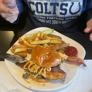Jalapeño and bacon burger with fries