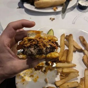The prime burger half way consumed