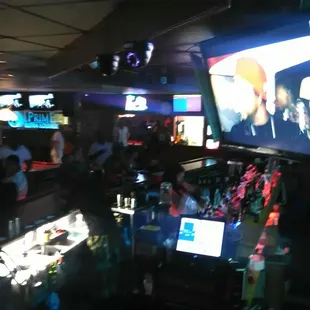 The great bartender (male) and the terrible bartender (female in pink shirt)