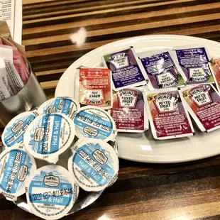 a plate of yogurt and yogurt cups