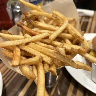 Crispy fries served in a cup.