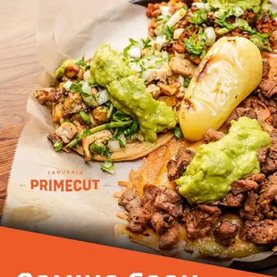 a plate of tacos and guacamole