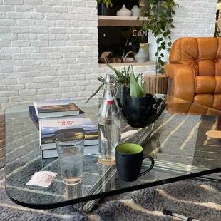 Seating area with nice comfortable chairs and sofas.