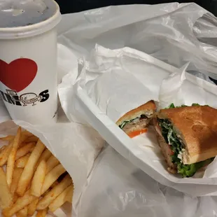 Steak sandwich. Fries. Soda