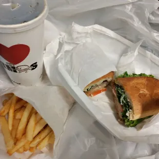 Steak sandwich. Fries. Soda