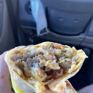 Sausage and bacon breakfast burrito
