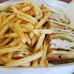 Club sandwich with fries