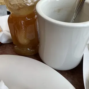 Dirty cup with leftover residue.