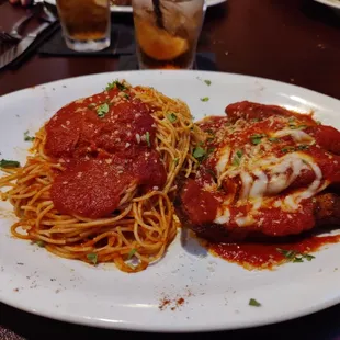a plate of spaghetti and meat