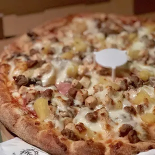 a pizza in a pizza box