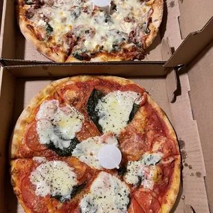 Greek pizza and margherita pizza.