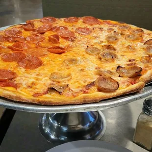 13" Pizza, half pepperoni, half sausage.