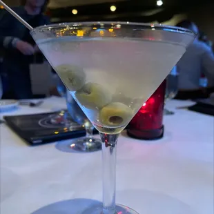 a martini with olives