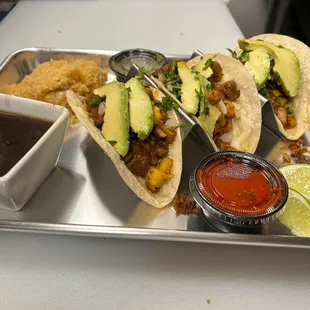 Try our Al Pastor tacos!