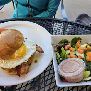 PB&amp;j Burger with egg and a side salad.