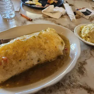 Breakfast chorizo burrito smothered