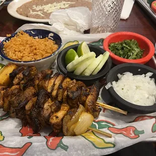El pastor skewers with Mexican rice