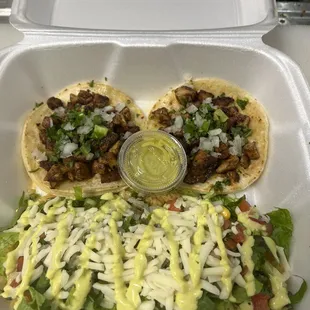 Chicken tacos and salad