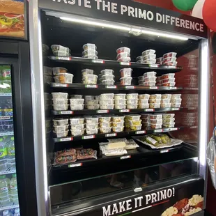 a deli case filled with food