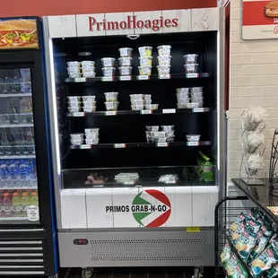 a display of frozen food in a grocery store