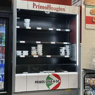 a grocery store with a refrigerator