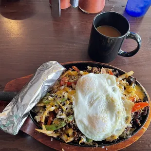 #5 Skillet Breakfast with chorizo and eggs over easy.