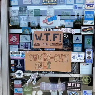 a sign in the window