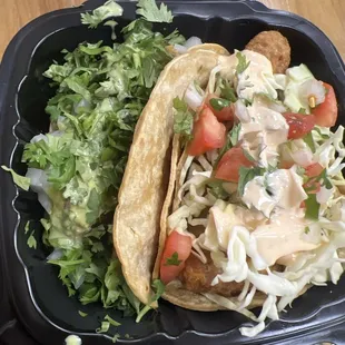 Shrimp and carnitas tacos