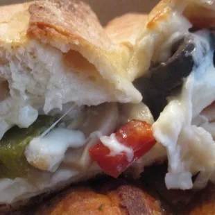 Innards of a veggie calzone $12