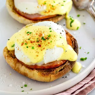 two eggs on a toasted english muffin