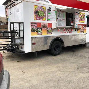 a food truck parked in a parking lot