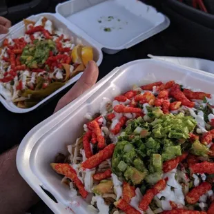 One carne asada nachos with everything on it plus hot Cheetos.  One carne asada fries with everything on it plus hot Cheetos. $9 each.