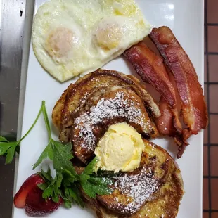 French toast, over medium eggs &amp; bacon! Yummy!