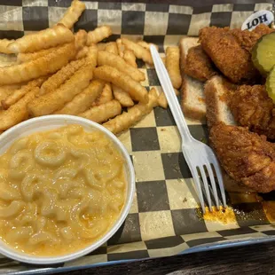 4 jumbo tenders Mac n cheese, fries.