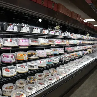 a variety of cakes on display