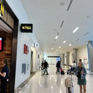 Signage and corridor to Concourse D