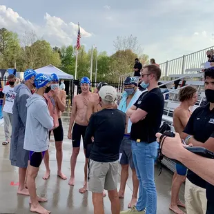 Olympian Jack Conger &amp; Jack Roach talk to swimmers in 200 Fly