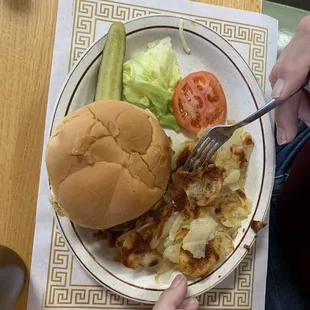 Juicy Cheeseburger with American fries.
