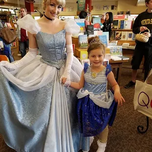Little princesses posed with Cinderella after story time in Wichita.