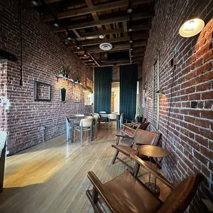 Beautiful brick walls and plenty of seating.  This is the room next to the bar area.