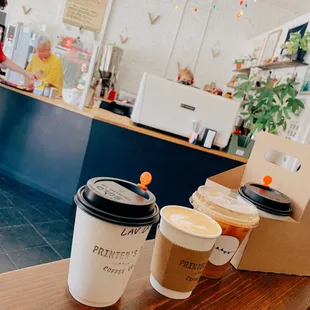 two cups of coffee on a counter