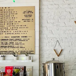 a menu on a brick wall